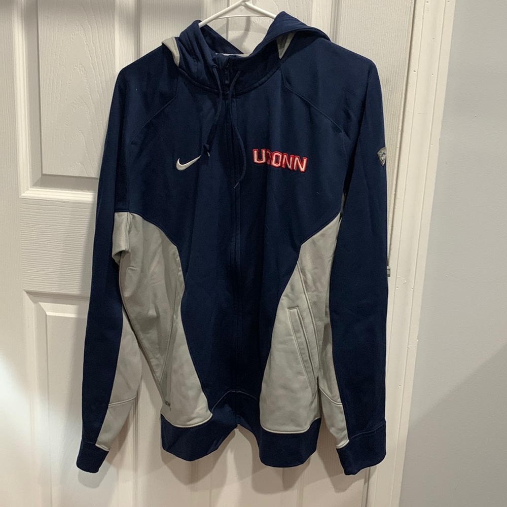 UConn branded zip up hoodie. Very lightly worn, great condition. Size large.